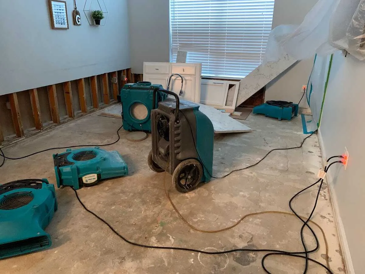 Dehumidifier in flood-cut room for Water Damage Restoration in Brandywine